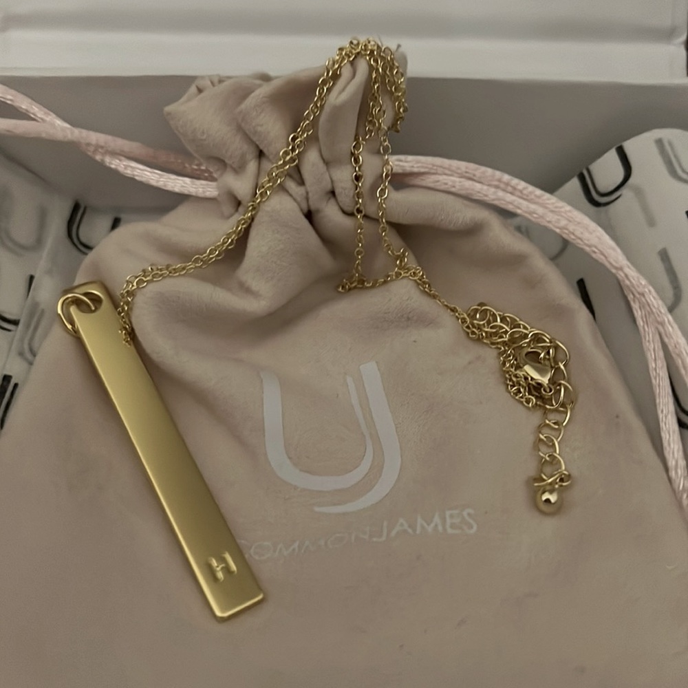 Uncommon James gold initial necklace.